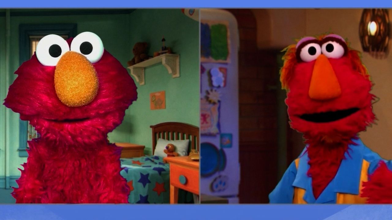 Elmo's father Louie, right, explains to Elmo what racism is and why people are protesting now.