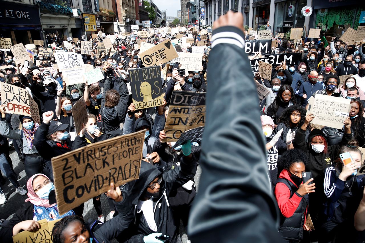 Demonstrators gather during a Black Lives Matter protest in Manchester, England, on Saturday, June 6.