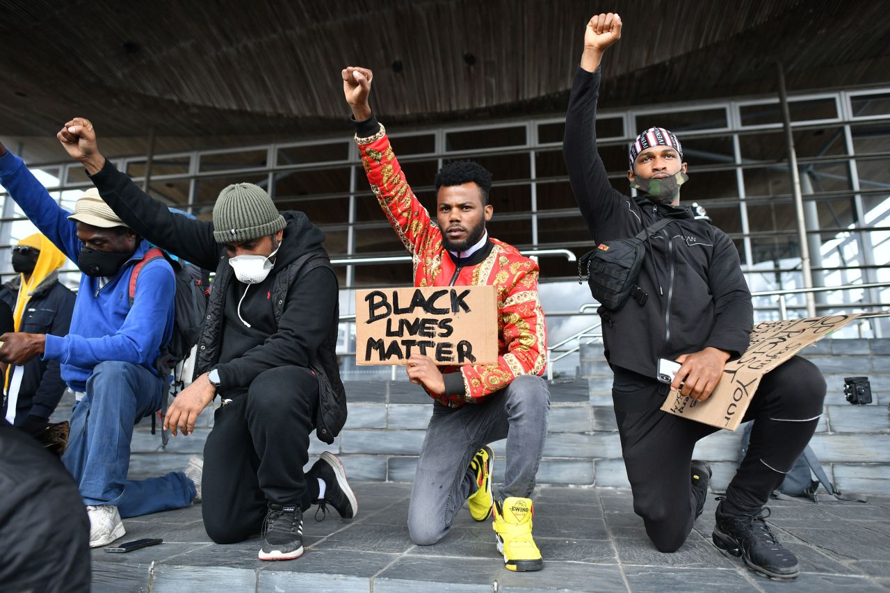 People take part in a Black Lives Matter rally in Cardiff, Wales.