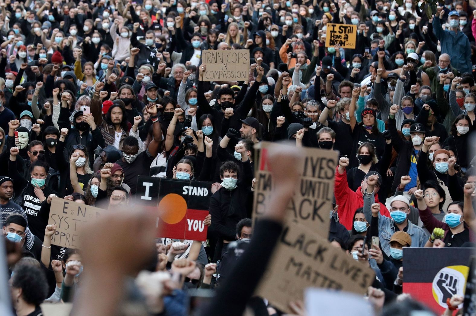 Protesters gather in Sydney on June 6. Many were threatened with fines and arrests if they protested.