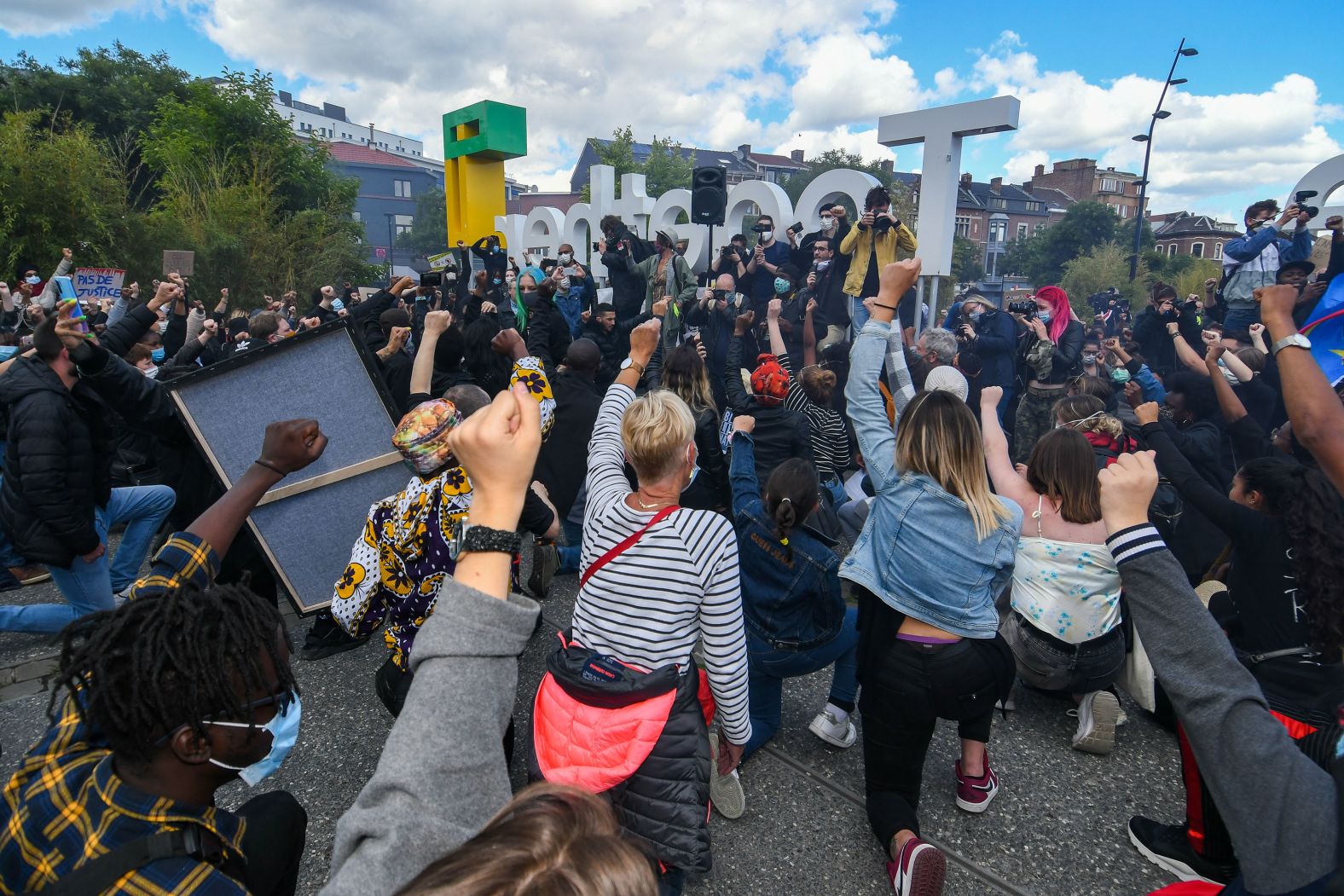 Protesters take a knee in Liege, Belgium.