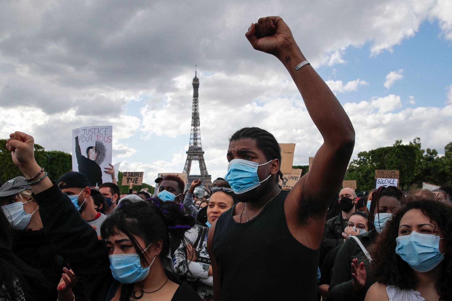 With the iconic Eiffel Tower in the background, demonstrators gather on the Champs de Mars in Paris on June 6.