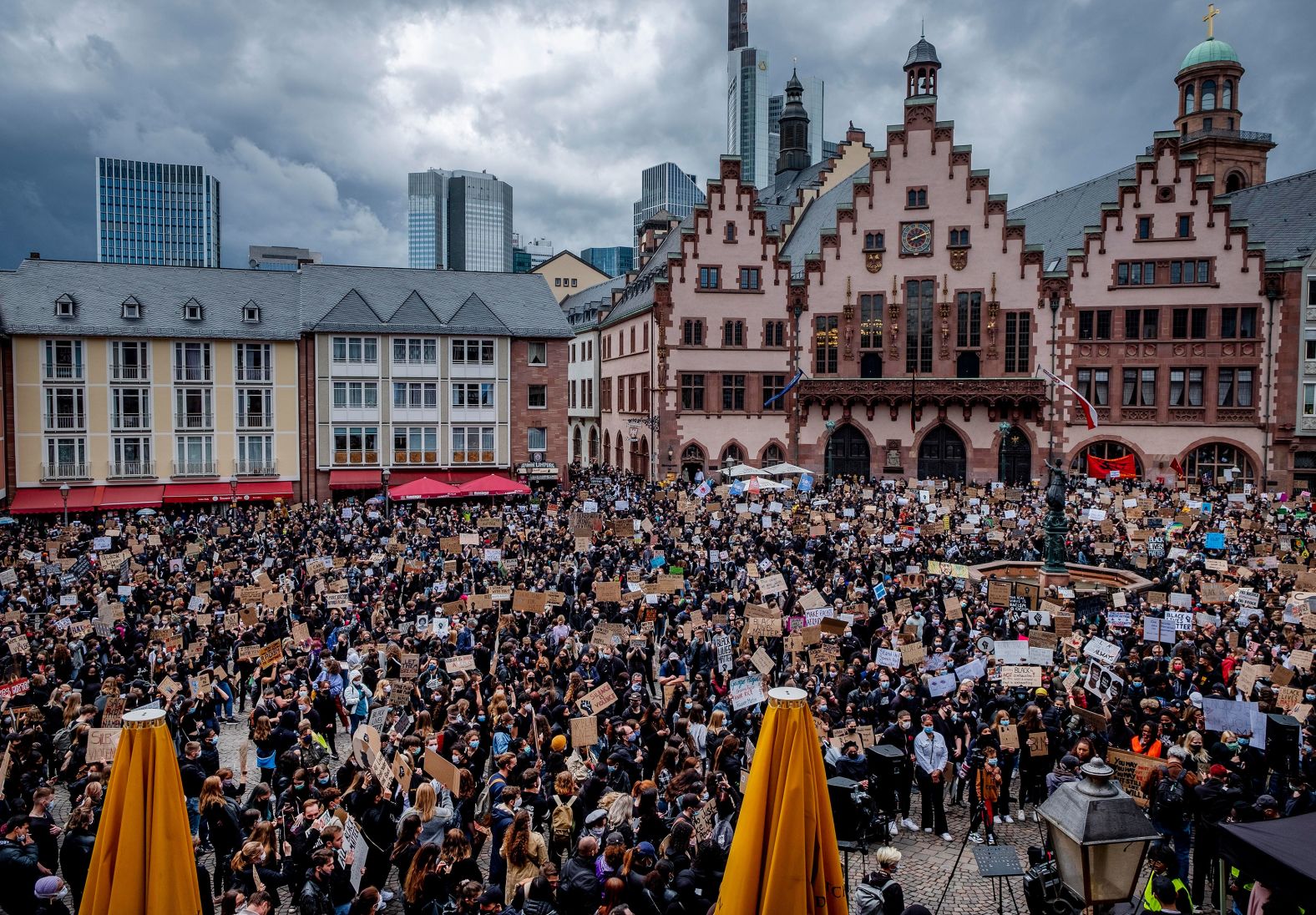 Hundreds of people attend a rally in Frankfurt, Germany, to honor George Floyd.