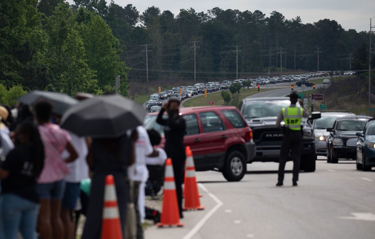 Mourners arrive for Floyd's public viewing in Raeford.