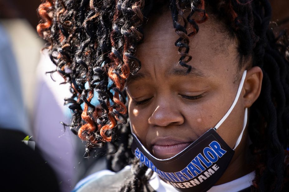 Tamika Palmer, the mother of <a href="https://www.cnn.com/2020/05/13/us/louisville-police-emt-killed-trnd/index.html" target="_blank">Breonna Taylor,</a> closes her eyes during a vigil for her daughter in Louisville, Kentucky, on June 6.