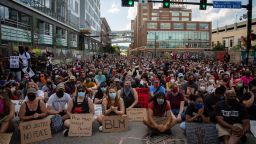 Protesters sit in a street during a demonstration against racism and police brutality in Pittsburgh, Pennsylvania, on June 6.