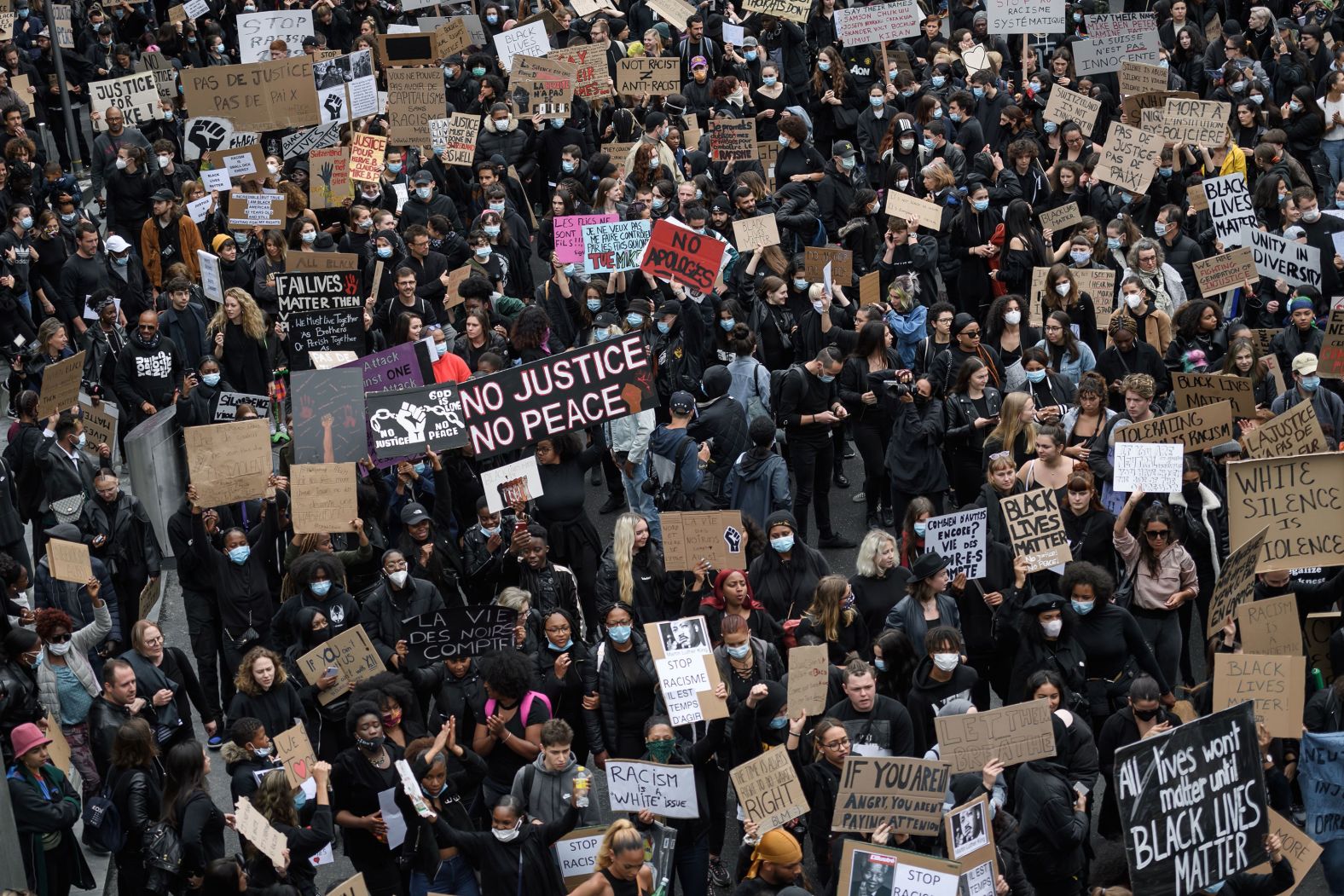 People protest in Lausanne, Switzerland, on June 7.