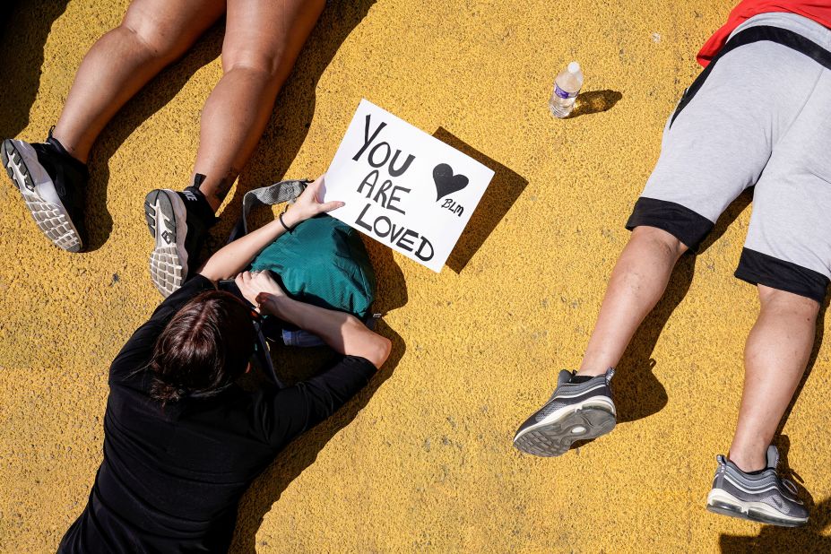 Protesters lie in a street near the White House on June 7.