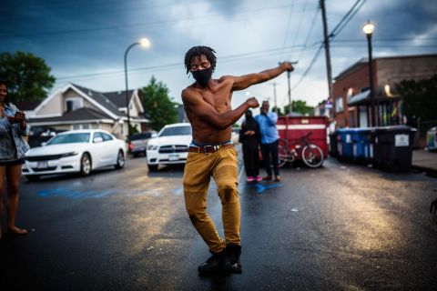 A man dances near Floyd's memorial in Minneapolis on June 6.