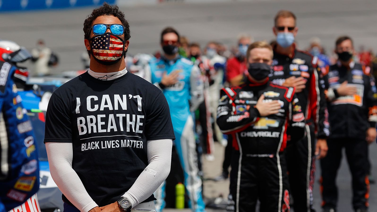 Bubba Wallace, driver of the #43 McDonald's Chevrolet, wears an "I Can't Breath - Black Lives Matter" T-shirt under his fire suit in solidarity at Atlanta Motor Speedway on June 7, 2020.