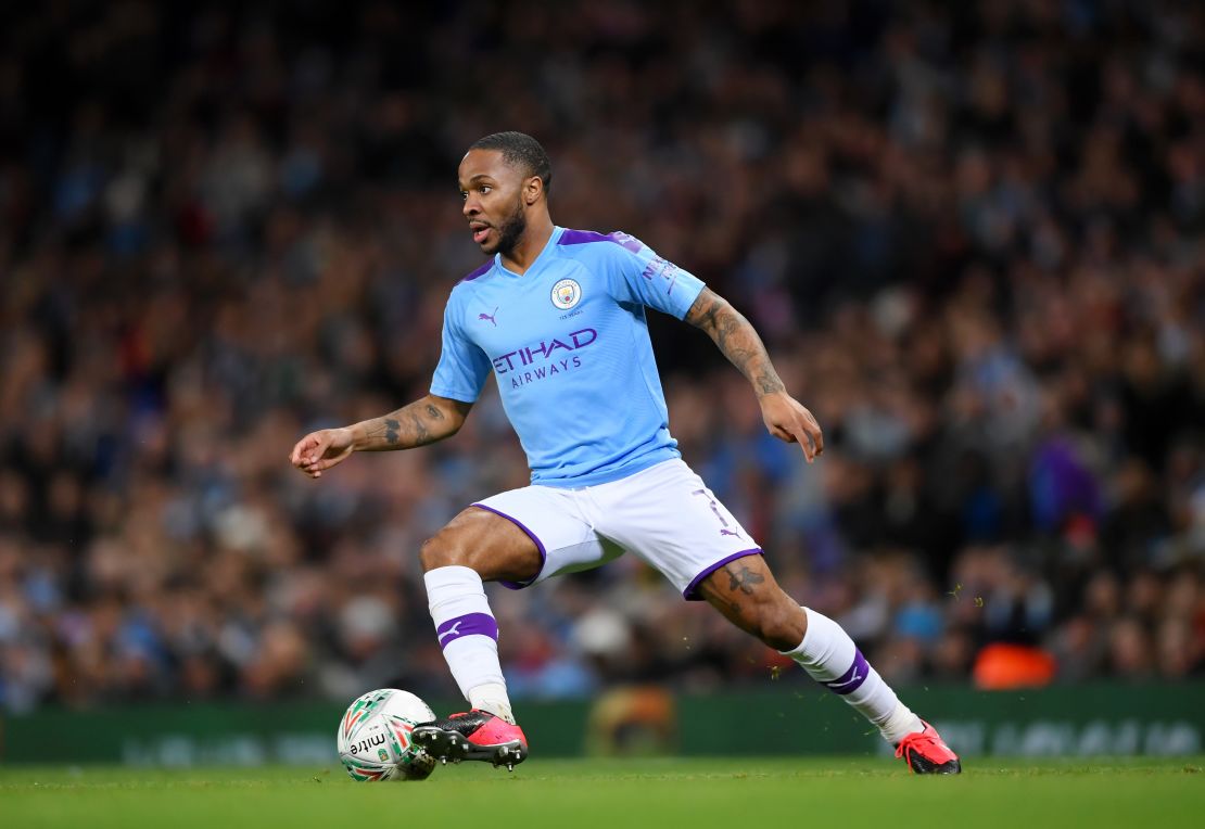 Sterling runs with the ball during the Carabao Cup Semi Final match against Manchester United.