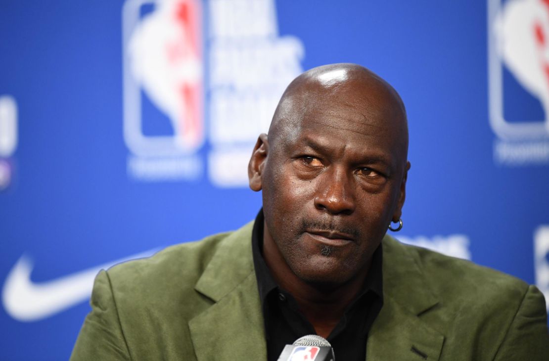 Michael Jordan addresses a press conference ahead of a game between Milwaukee Bucks and Charlotte Hornets.