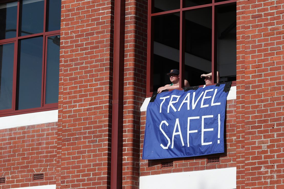 Local residents sent messages of positivity to crew and passengers on board the Artania when it was quarantined in Fremantle, Western Australia.