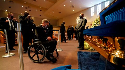 Texas Gov. Greg Abbott passes by the casket of George Floyd during a public visitation at the Fountain of Praise church, Monday, June 8, 2020, in Houston.