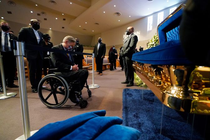 Texas Gov. Greg Abbott pays his respects at Floyd's casket. "Today is a sad day. Ever since his death has been a sad day," <a href="index.php?page=&url=https%3A%2F%2Fwww.cnn.com%2Fus%2Flive-news%2Fgeorge-floyd-memorial-service-protests%2Fh_f4a90ff56bef88c8dd35197d45c783bc" target="_blank">Abbott told reporters outside the church.</a> "This is the most horrific tragedy I have ever personally observed. But George Floyd is going to change the arc of the future of the United States. George Floyd has not died in vain. His life will be a living legacy about the way that America and Texas respond to this tragedy."