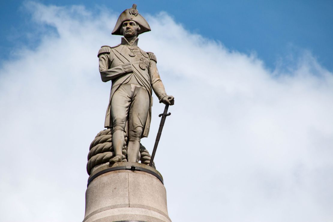 Nelson's Column, topped by a statue of Admiral Horatio Nelson, towers over Trafalgar Square in Central London.