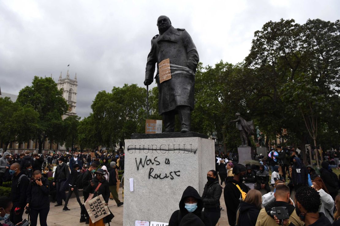 Protesters gather in Parliament Square, London, around the statue of Winston Churchill after it was defaced during a Black Lives Matter protest in June 2020.