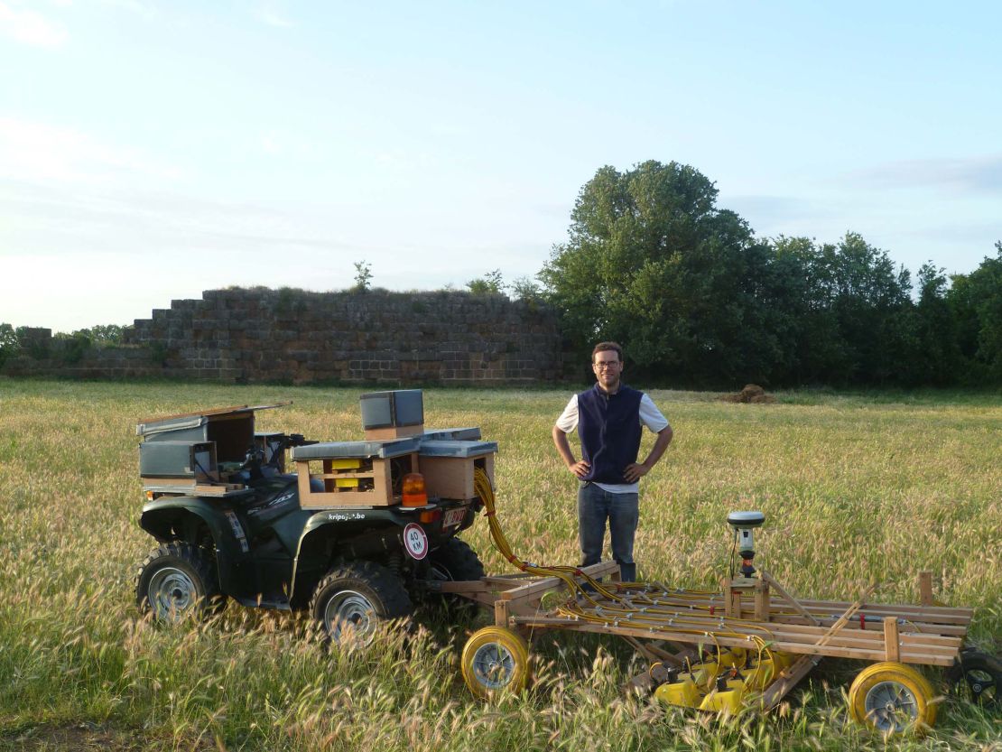 Archaeologists used an all-terrain vehicle to pull their instruments over the land.