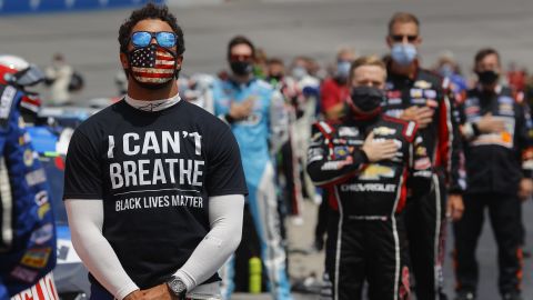 Bubba Wallace, the only full-time African American driver in NASCAR's Cup Series, wears a T-shirt that says "I Can't Breathe" and "Black Lives Matter" during the National Anthem before the NASCAR Cup Series Folds of Honor QuikTrip 500 at Atlanta Motor Speedway on June 7, 2020.