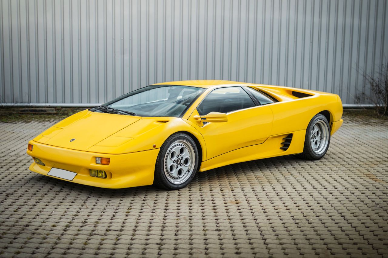 <strong>1991 Lamborghini Diablo</strong><br /><strong>Sold for: €126,000 ($142,000)</strong><br /><br />Introduced in 1990, the Diablo was Lamborghini's long overdue replacement for the Countach, a model that had been in production in 1974.<br /><br />The Diablo's initial design was again by Gandini, but it was reworked by Chrysler Corp. designer Tom Gale. (Chrysler had purchased Lamborghini in 1987 and sold it in 1994.) <br />Powered by a 492-horsepower V12, the Diablo was the first Lamborghini capable of going more than 200 miles an hour.