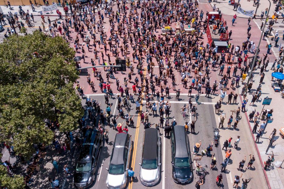 Black Lives Matter supporters gather in Los Angeles for a memorial service honoring George Floyd on June 8. 