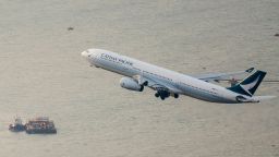 A Cathay Pacific passenger airplane takes off from Hong Kong's Chek Lap Kok International Airport on March 10, 2020.
