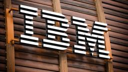 Milan, Italy - May 26, 2019: IBM logo sign (International Business Machines Corporation) on IBM Studios, the wooden building called Pavilion in Gae Aulenti square.