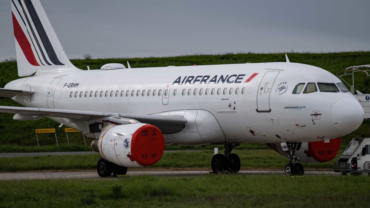 This picture shows an Air France plane parked on the tarmac at Paris' Charles de Gaulle Airport.