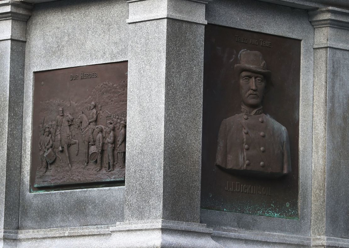 Plaques in honor of Confederates are seen on the base of a monument in Hemming Park.