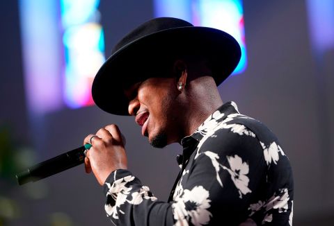 R&B artist Ne-Yo sings at the service. He performed a rendition of "It's So Hard to Say Goodbye to Yesterday."