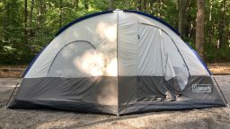 Claytor Lake, Virginia - July 19, 2018: A Coleman brand family tent sits ready for use at a wooded campground at Claytor Lake State Park.