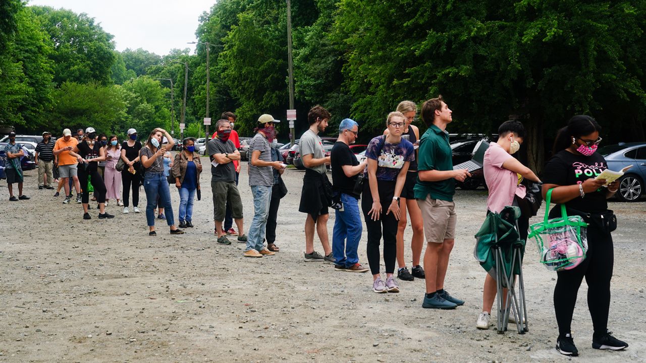 People wait in line to vote in Georgia's Primary Election on June 9, 2020 in Atlanta