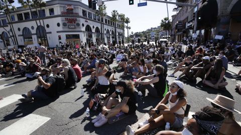 Demonstrators stage a sit-in on Tuesday, June 9, on Sunset Boulevard in Los Angeles during a protest over the death of George Floyd.