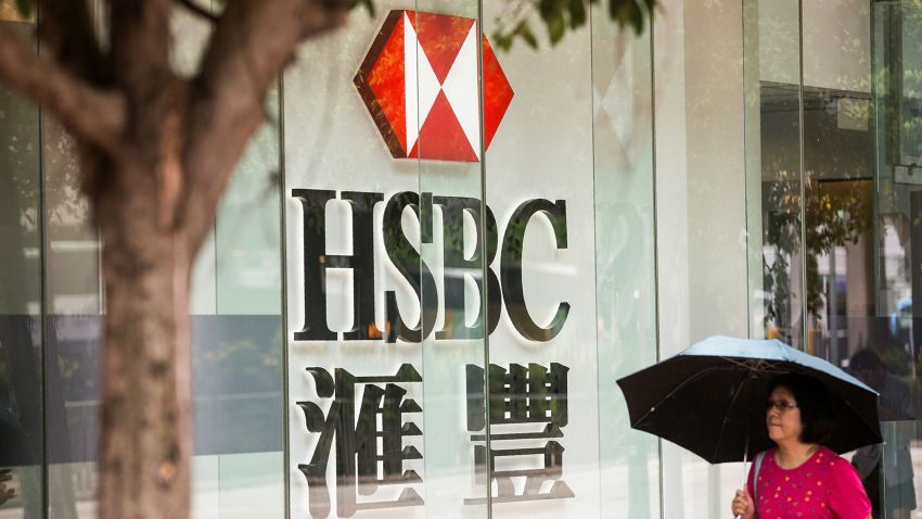 A pedestrians walks past HSBC signage in the Admiralty district of Hong Kong on July 31, 2017.
HSBC said on July 31 pre-tax profit for the first half of 2017 had risen five percent to 10.2 billion USD compared with the same period last year, in what it called an "excellent" result following a turbulent 2016. / AFP PHOTO / ISAAC LAWRENCE        (Photo credit should read ISAAC LAWRENCE/AFP via Getty Images)