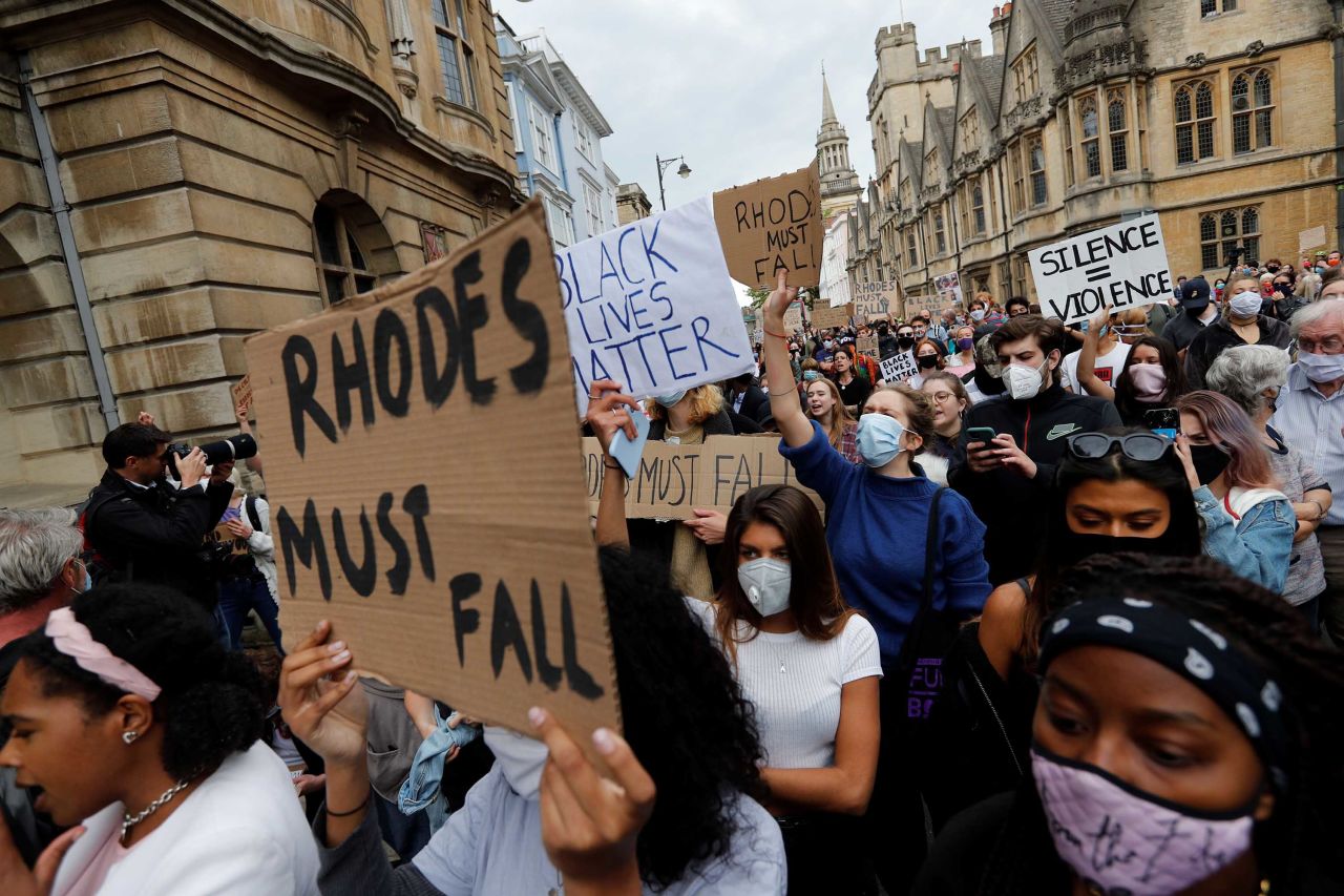 Protestors gathered outside Oriel College on Tuesday.