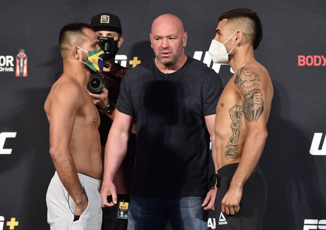 White hosts a face off between  Jussier Formiga (left) and Alex Perez (right).