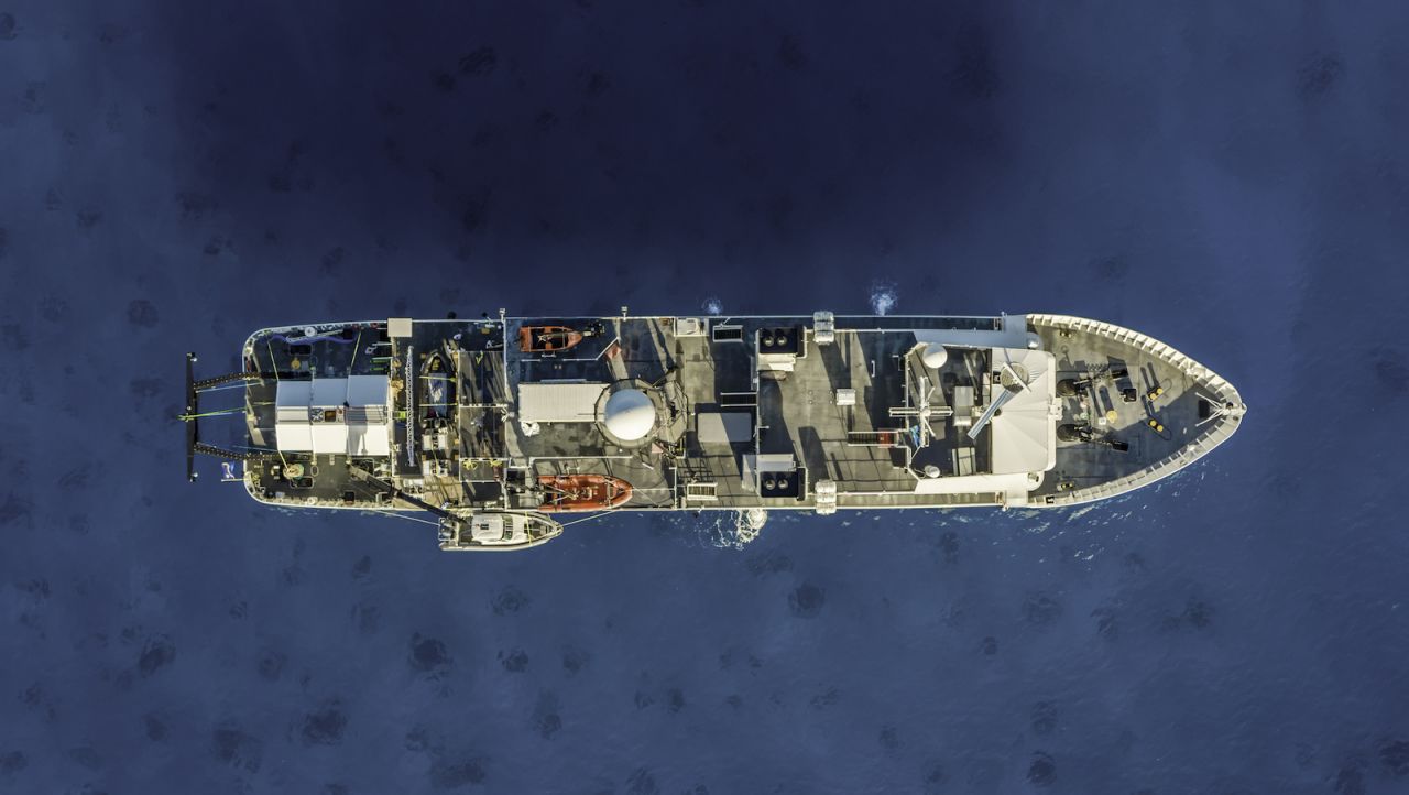 An aerial view of the DSSV Pressure Drop, which serves as the expedition's purpose-built 'mother ship' and primary operations platform.