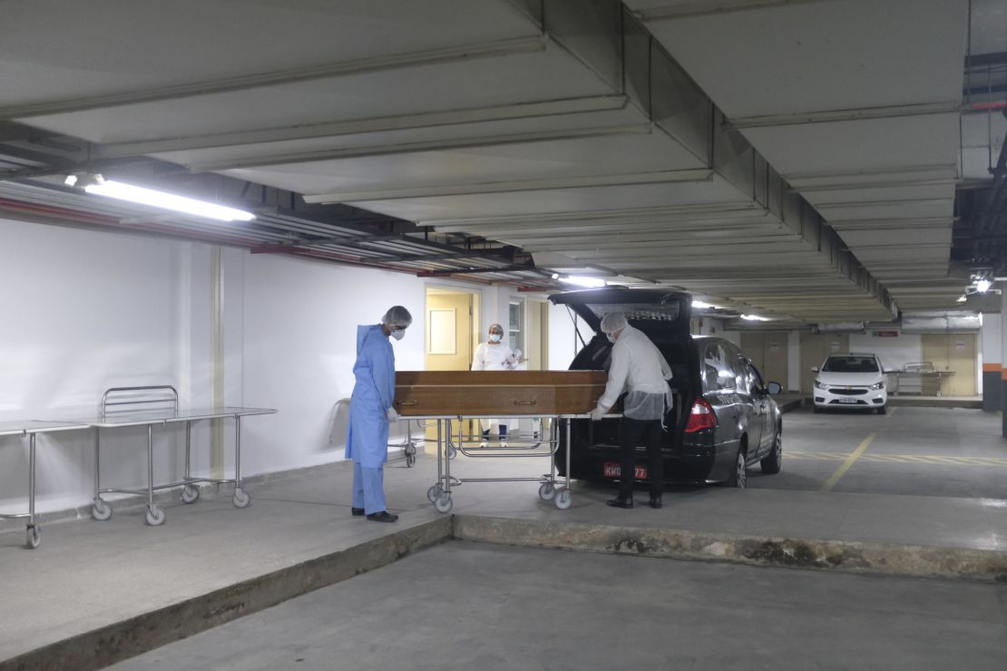 A coffin is wheeled out of the morgue at Ronaldo Gazolla Municipal Hospital in Rio de Janeiro.