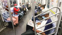 Passengers wear face masks and observe social distancing on the New York City Subway on May 18, 2020 in New York City.  
