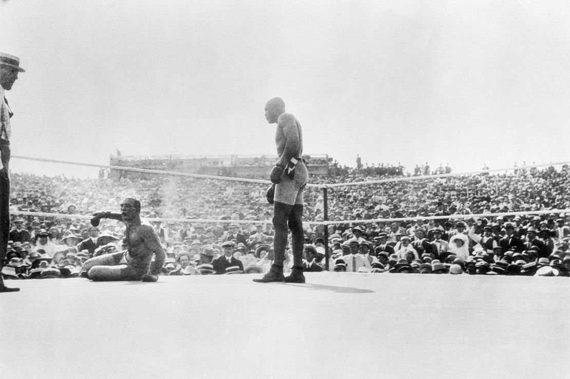 Johnson (right) knocks down Jeffries in the 15th round.