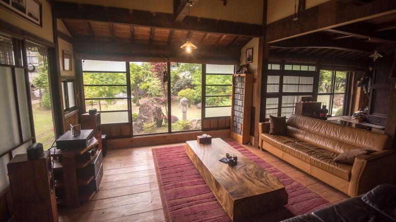 The Fradales' living room looks out on their garden.