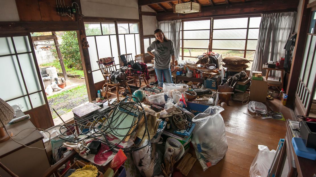 "Kim's resignation is painfully clear," says Paul of this photo, taken before the house was cleaned out.