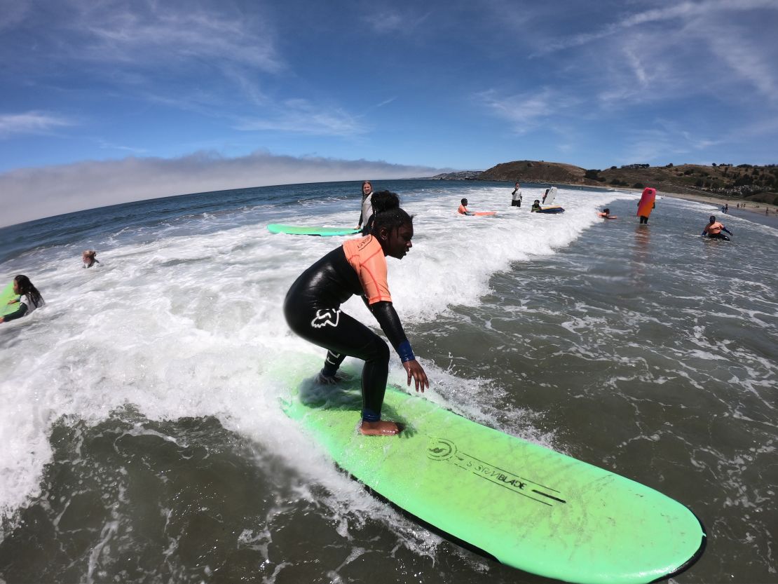 Children surfing with the City Surf Project summer camp in 2019.