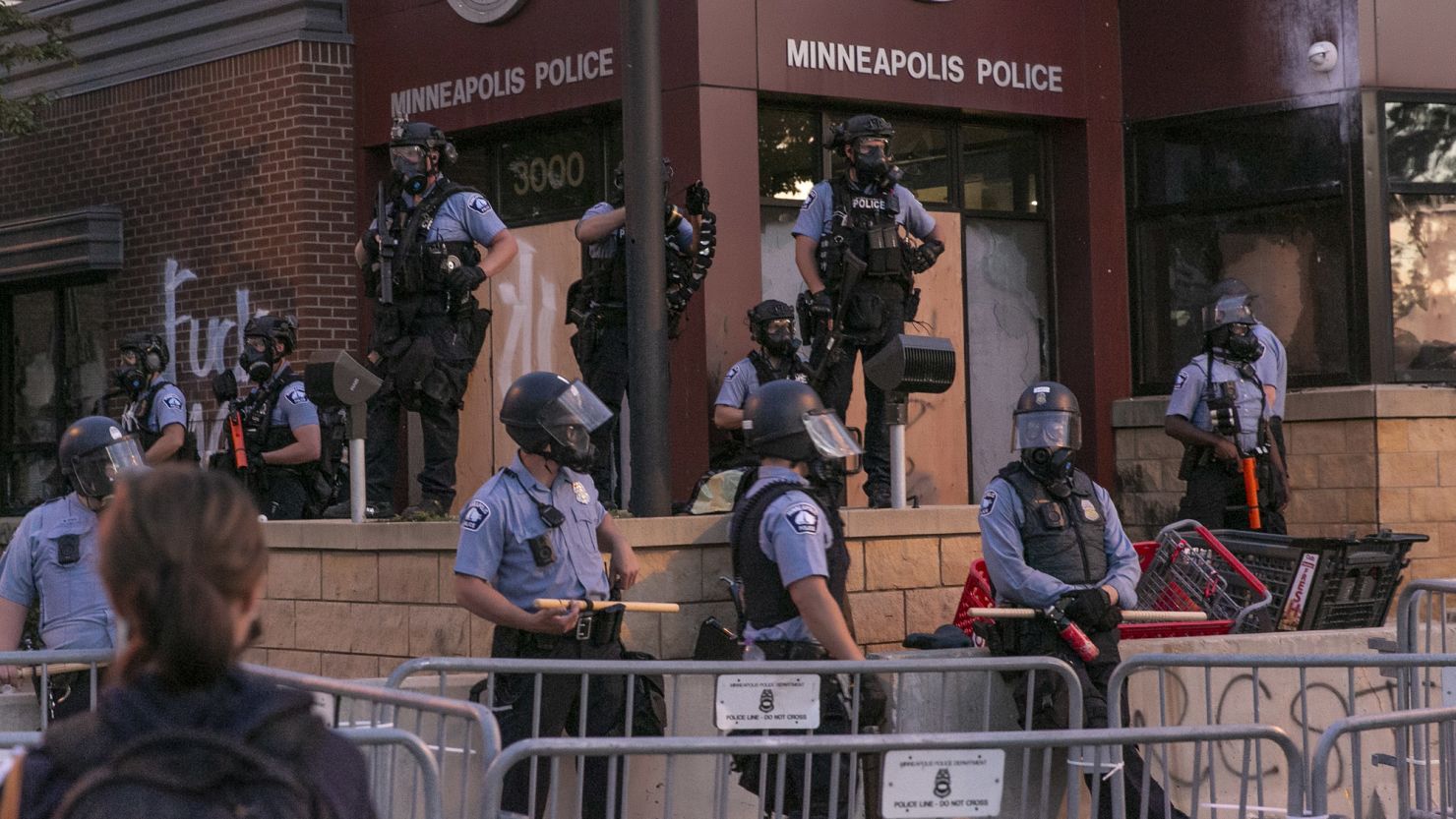 Police stand guard at a Minneapolis Police precinct in Minneapolis on May 27, 2020.