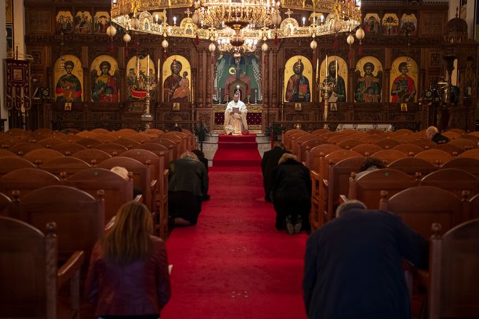Parishioners are welcomed back to a Greek Orthodox church in Keilor East, Australia, on June 7. Religious services and gatherings for up to 20 people are now permitted in the state of Victoria.