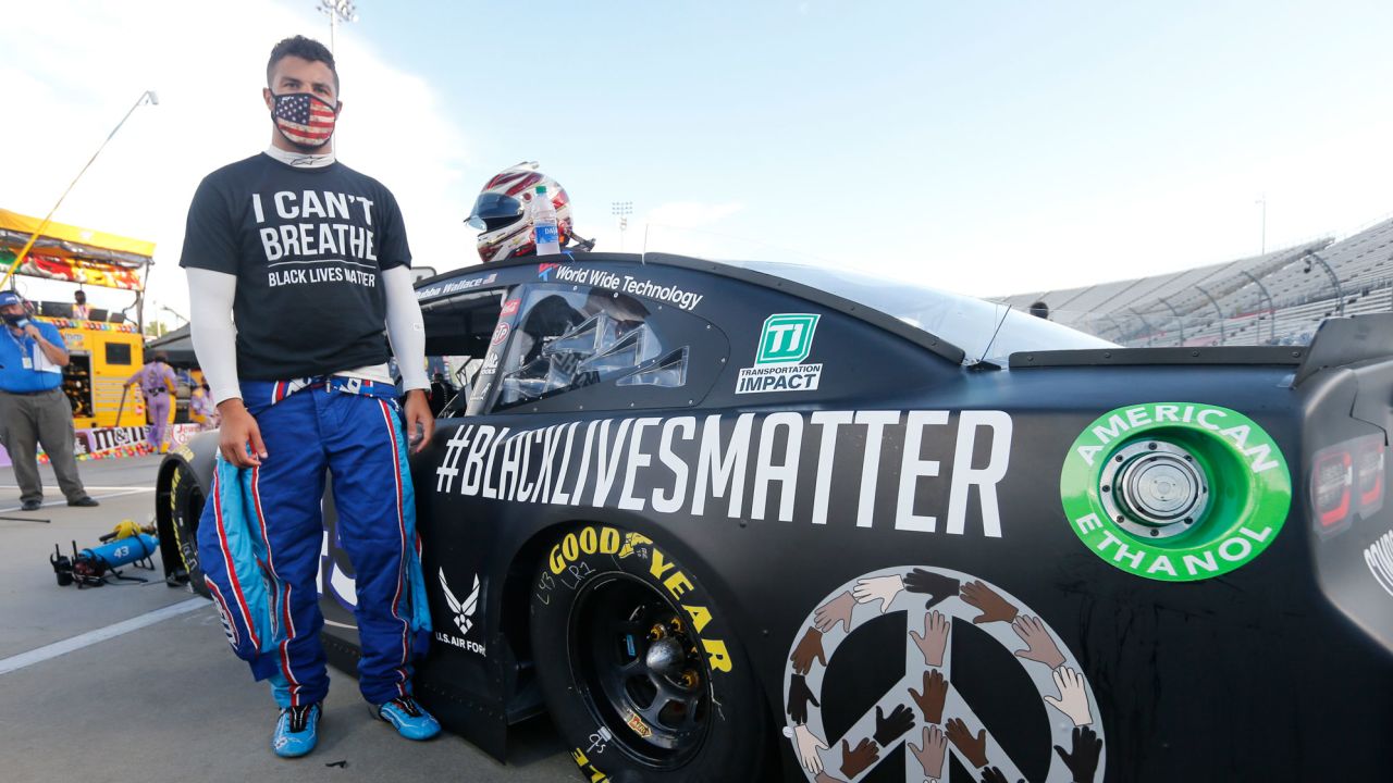 Driver Bubba Wallace waits for the start of a NASCAR Cup Series auto race Wednesday, June 10, 2020, in Martinsville, Virginia.