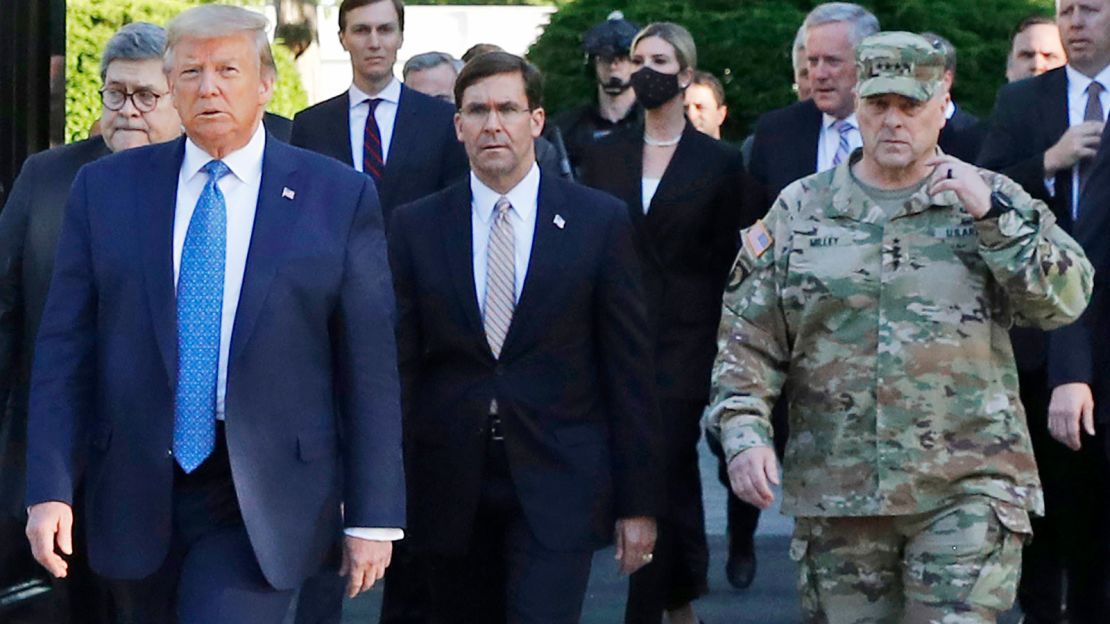 Gen. Mark Milley, chairman of the Joint Chiefs of Staff, right, has since called his presence at Trump's St. John's Church walk "a mistake".