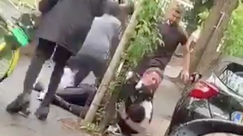 A grab from video shared by Hackney Police on Twitter shows police officers being attacked in London's Hackney neighborhood on June 10.
