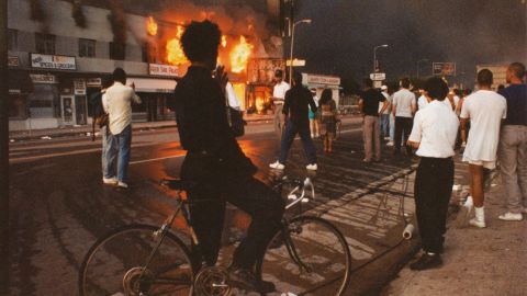 Businesses beginning to burn on Pico Boulevard during the Rodney King riots on April 30, 1992 in Los Angeles.