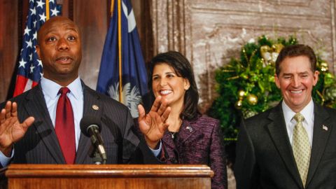 US Rep. Tim Scott speaks Monday to reporters at the South Carolina Statehouse after being introduced by then-Gov. Nikki Haley to fill the vacant US Senate seat vacated by the departing DeMint in December 2012. 